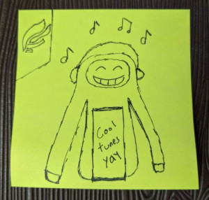 A post it note of Creepy Doll listening to music.