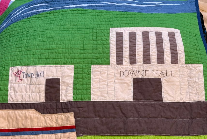 A closeup on the Town(e)s Hall section of the quilt