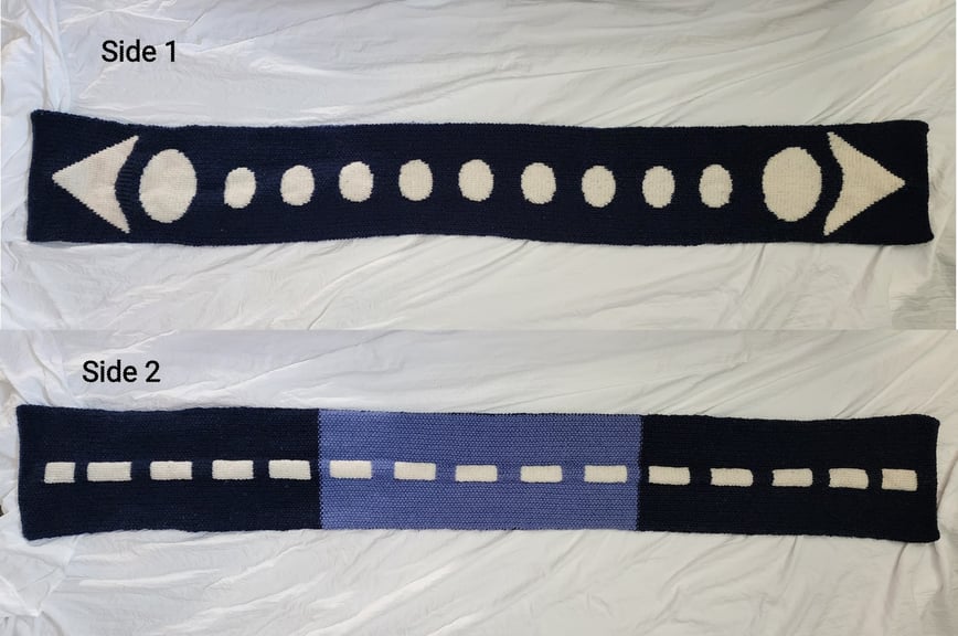 Both sides of scarf shown, Side 1 has LRR arrow and bubbles running the length and side 2 has the desert bus road median running the length. 