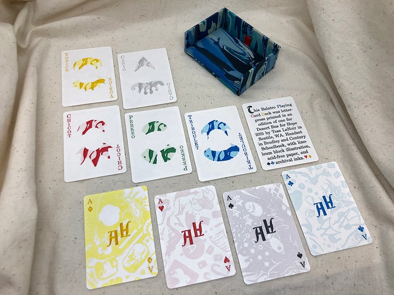 The Legendary Jokers, colophon card, and the Ace from each suit. 