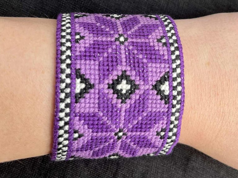 Bracelet worn on wrist.