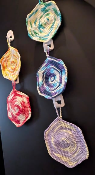 Trivets hanging out on hooks