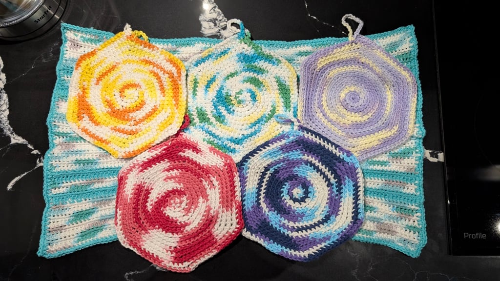5 dish trivets and a Tea Towel, inspired by the Shift Banners 

Top: Dawn Guard, Omega, Zeta
Bottom: Alpha Flight, Night Watch
Underneath: Omega Tea Towel