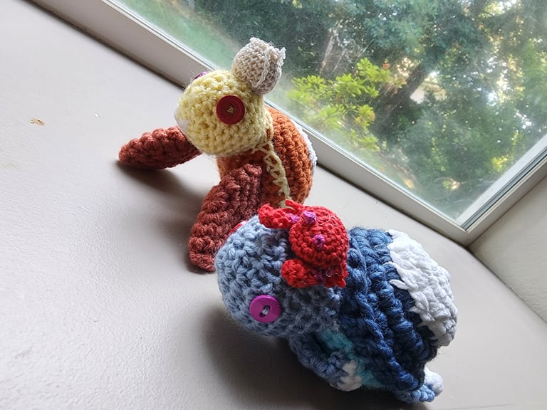 Dawnguard and Nightwatch turtles, each with a noggin buddy, Dawnguard having a coffee cup, and nightwatch being prepared for Crab Time