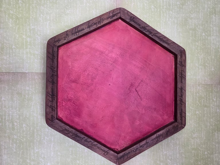 Black Walnut with a burgundy stained leather. (Top right side and bottom left side read "Desert Bus for Hope 2025" the other sides read Dawnguard : Alpha Flight : Night Watch : Zeta : Omega) 
