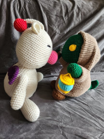 Moogle and Tonberry having a very important meeting.