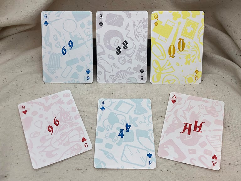 Several individual cards, showing joker icons like: 8 Ball, Campfire, Wee Joker, Superposition, Acrobat, Square Joker, Hanging Chad.
