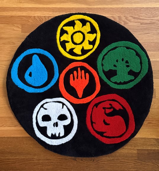 MTG Mana Symbols Tufted Rug shown in indoor wood floor location!