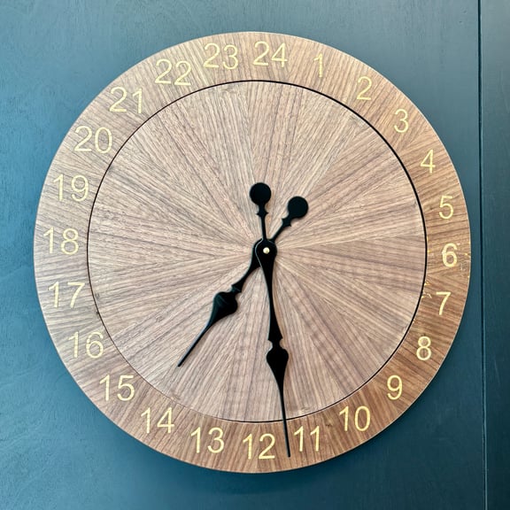 16 part starburst disc made of walnut veneer. 