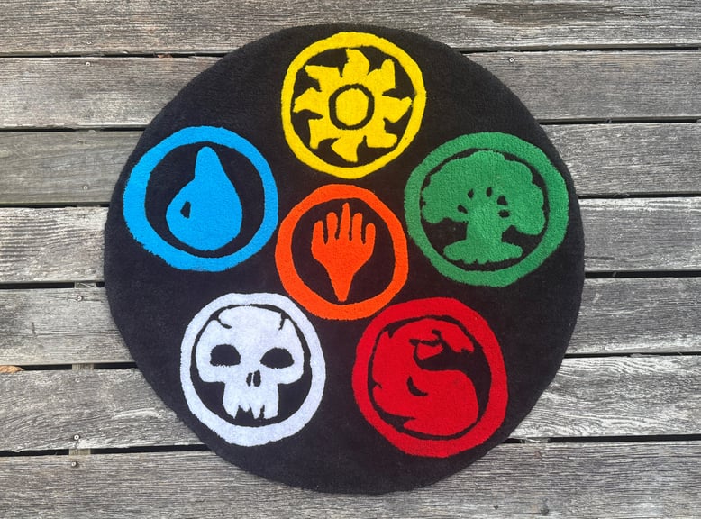 MTG Mana Symbols Tufted Rug shown in outdoor wood deck location!