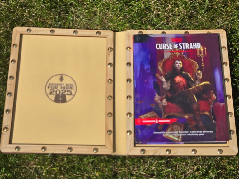 Inside the book with Curse of Strahd (safely in the sun and not included) for scale