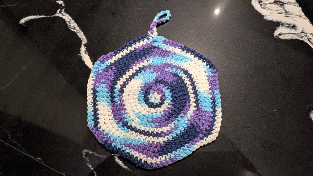 Night Watch Trivet close up, featuring the knotted side of the design